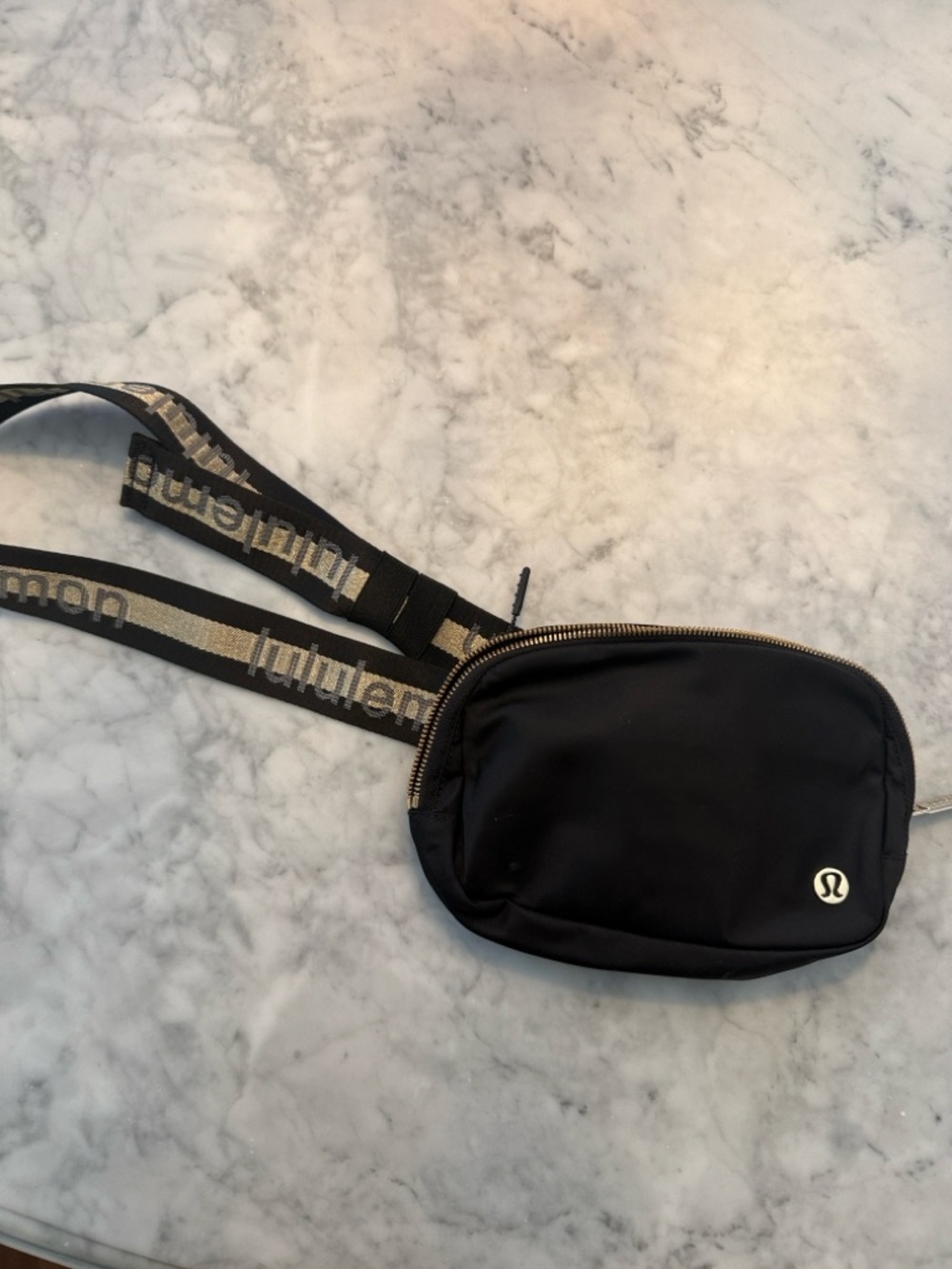 lululemon athletica Black Crossbody Pouch with Gold-Trim Strap